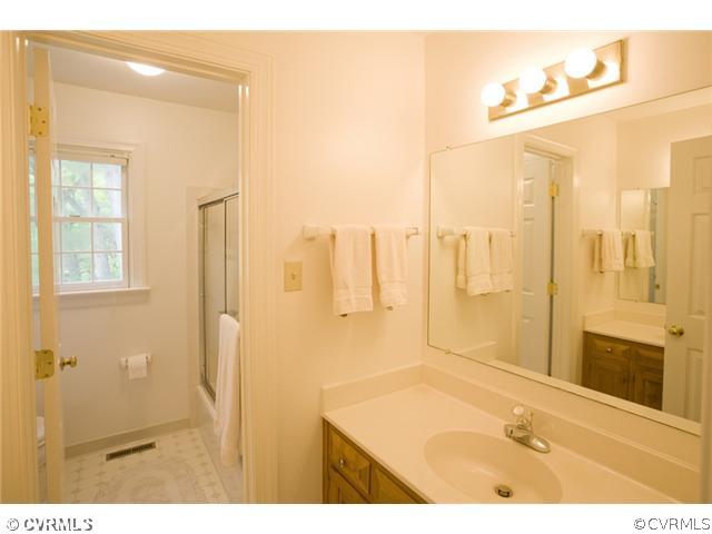 8205 Yolanda Road Henrico, VA 23229 - Photo 20 of 24 Bathroom - Hall Bath features dual vanities and ti