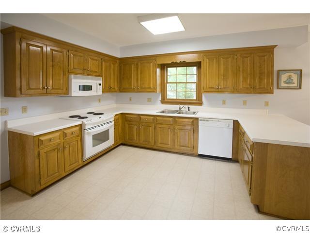 Kitchen - Open kitchen with new flooring, eat-in b