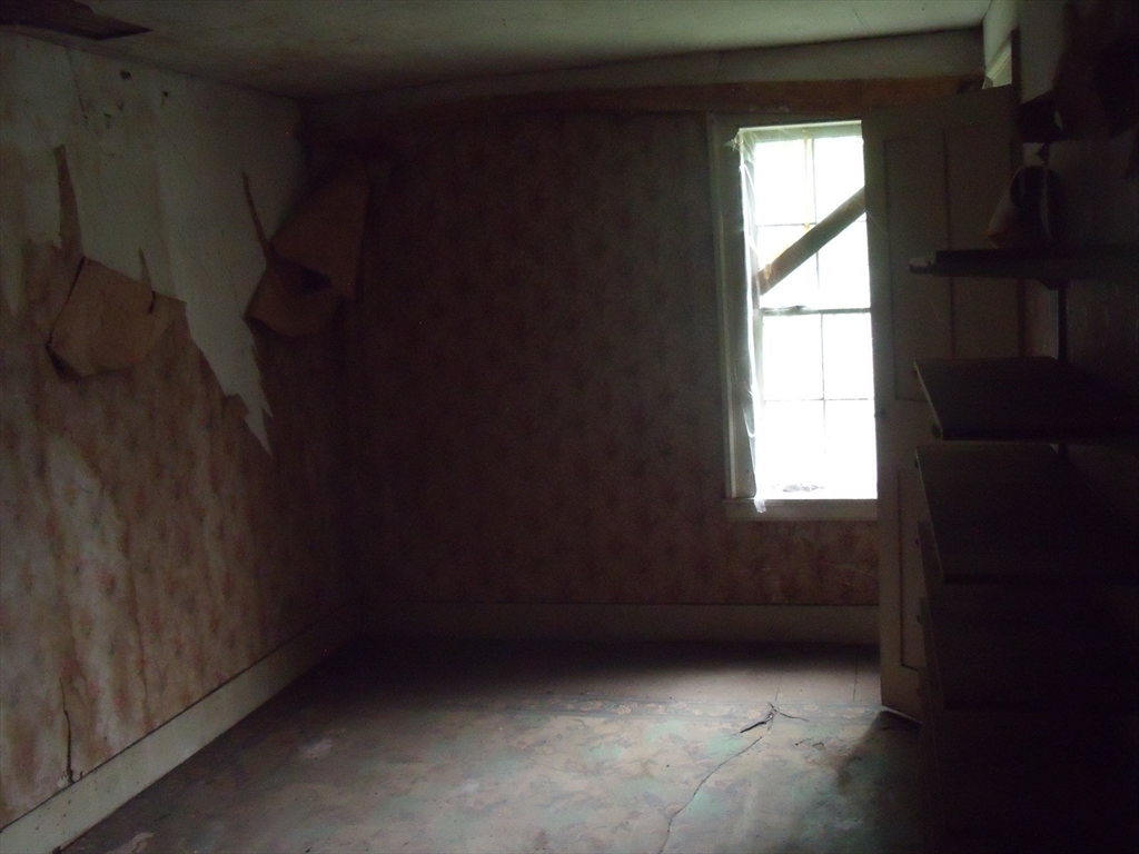 35 Goshen Road Williamsburg, MA 01096 - Photo 5 of 21 a view of an empty room with a window