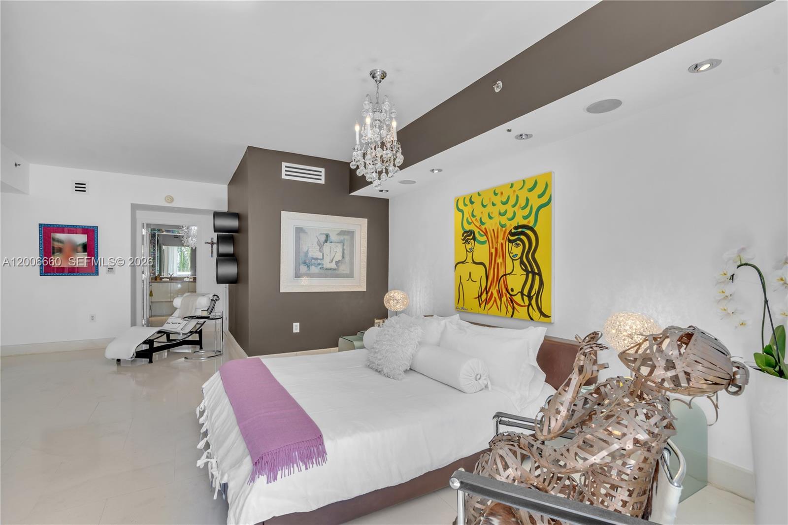 400 Alton Road, Unit 706 Miami Beach, FL 33139 - Photo 8 of 15 a bedroom with a bed window and couch