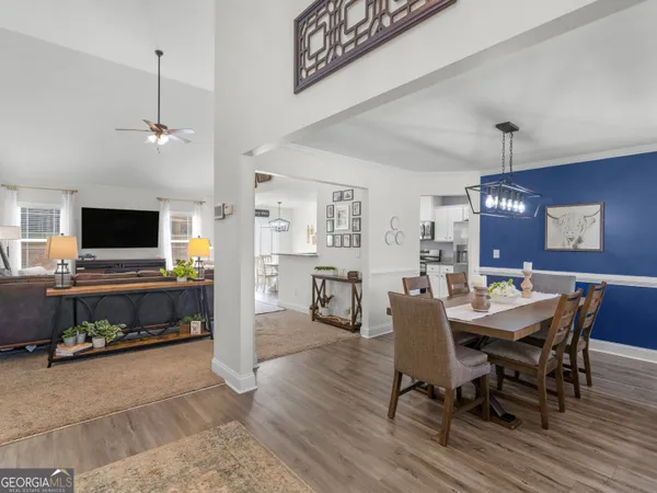 a view of a dining room with furniture