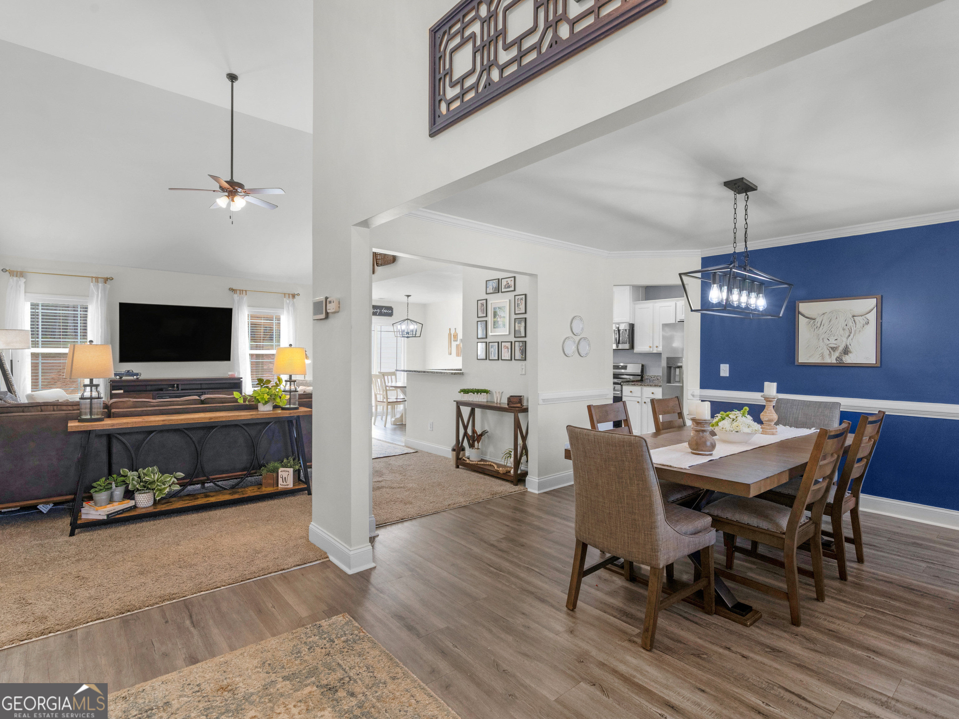 119 Mylee Cove Barnesville, GA 30204 - Photo 12 of 57 a view of a dining room with furniture window and wooden floor