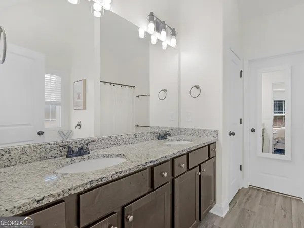 a bathroom with a shower and a tub