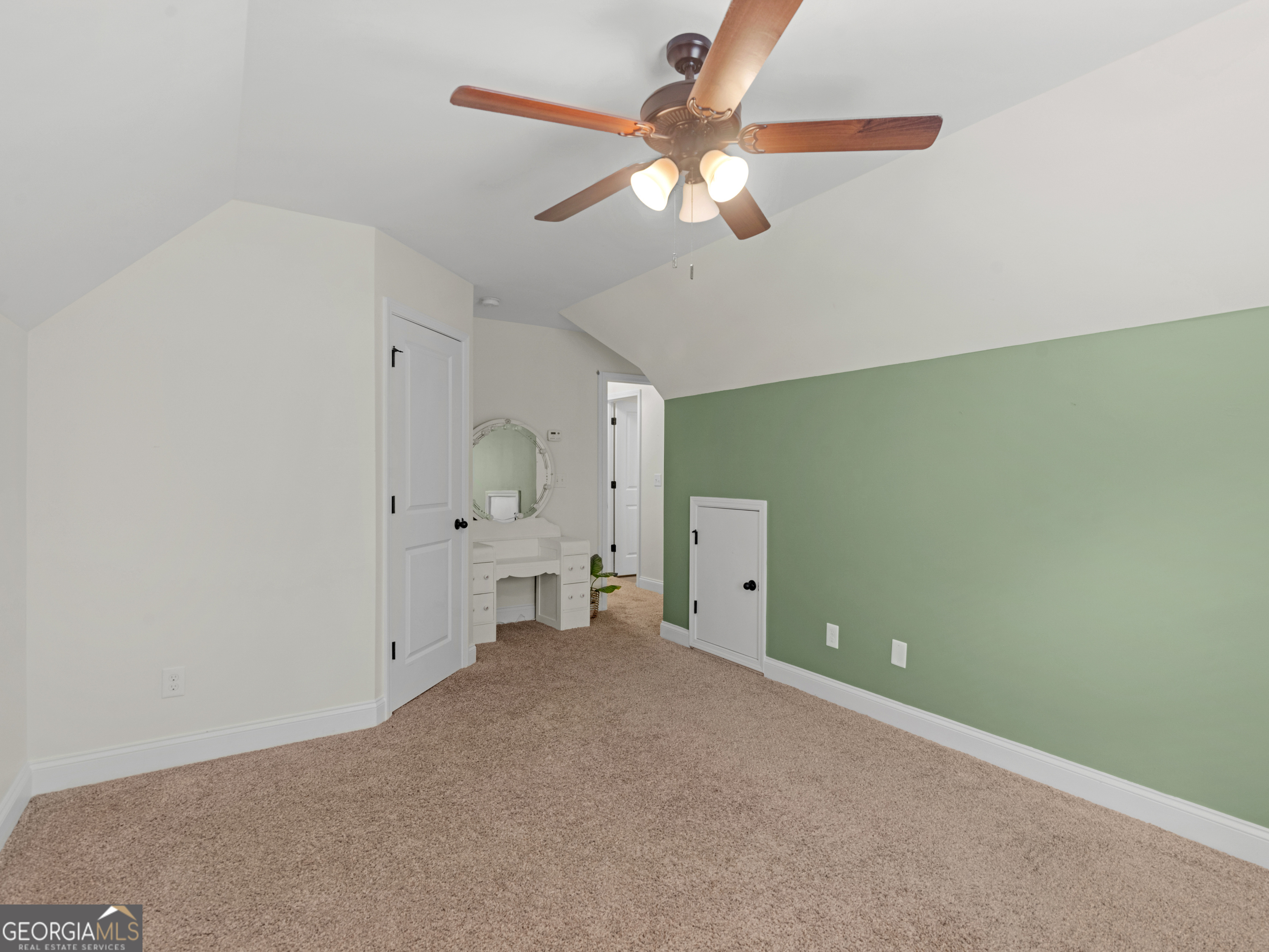 119 Mylee Cove Barnesville, GA 30204 - Photo 49 of 57 an empty room with a ceiling fan and a window