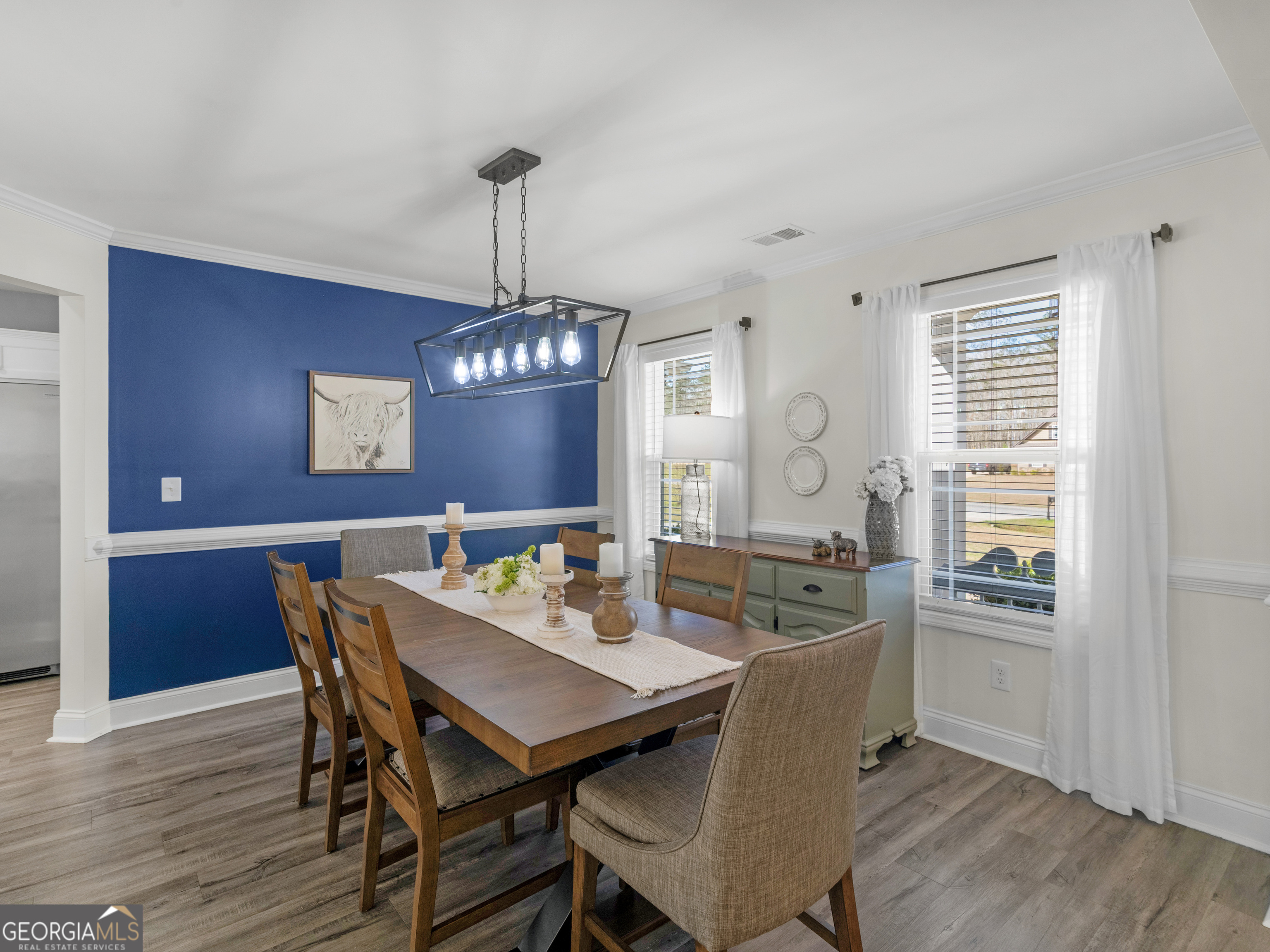 119 Mylee Cove Barnesville, GA 30204 - Photo 8 of 57 a view of a dining room with furniture window and wooden floor