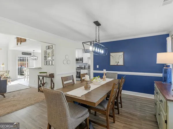 a view of a dining room with furniture