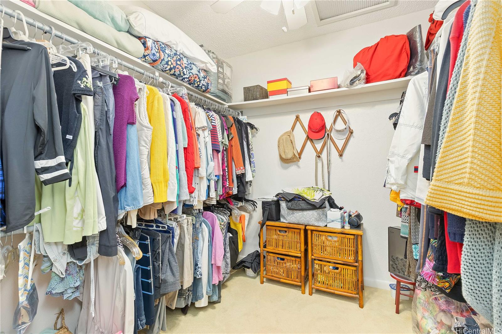 98-1421 Onikiniki Place, Unit 5 Aiea, HI 96701 - Photo 15 of 25 a view of walk in closet with clothes and shoes