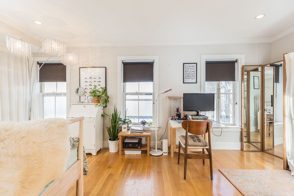 86 West Springfield Street, Unit 3 Boston, MA 02118 - Photo 5 of 12 a living room with furniture and a flat screen tv