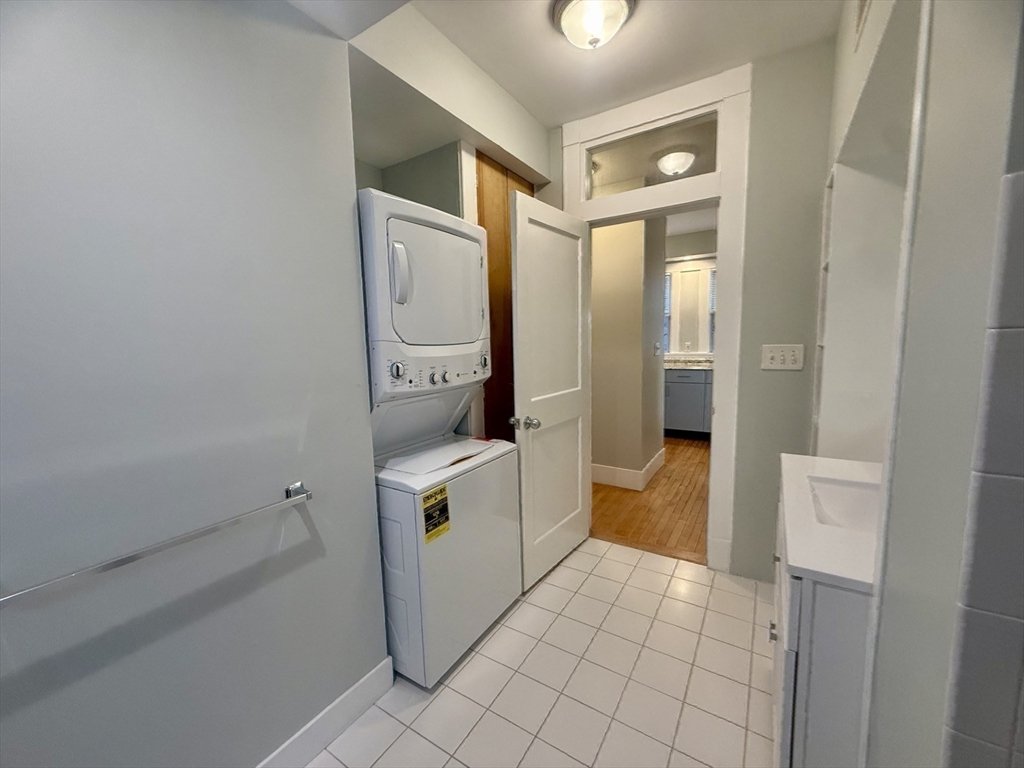 172 Maplewood Street, Unit 172 Watertown, MA 02472 - Photo 16 of 29 a bathroom with a sink a toilet and shower