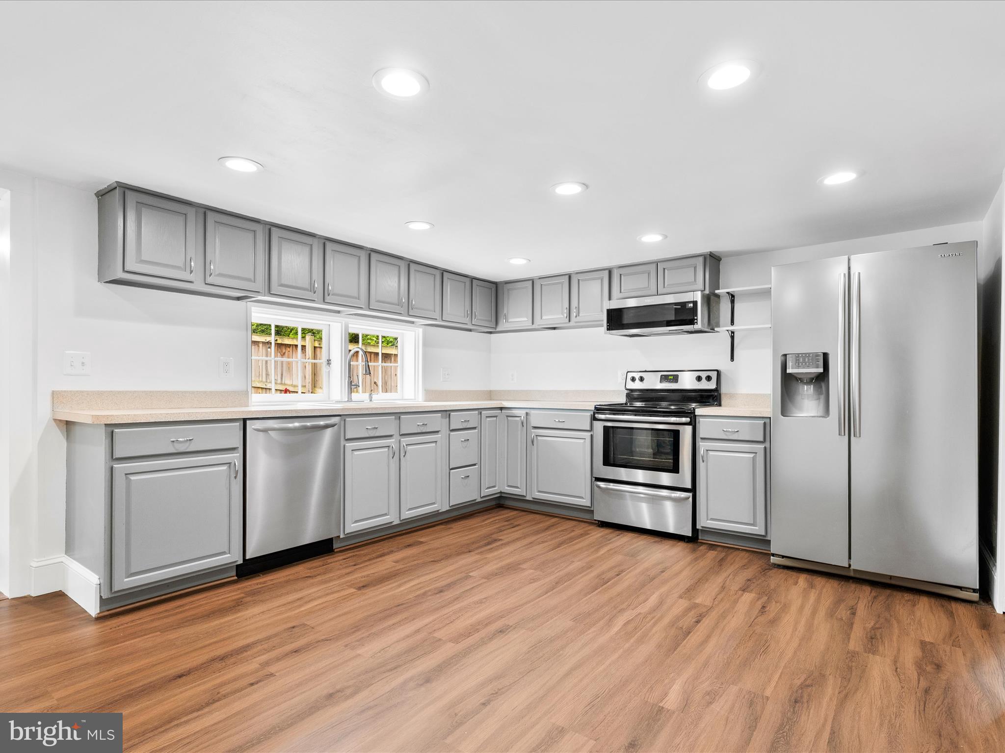 4417 Reels Mill Road Frederick, MD 21704 - Photo 16 of 64 a kitchen with stainless steel appliances a refrigerator and a stove top oven