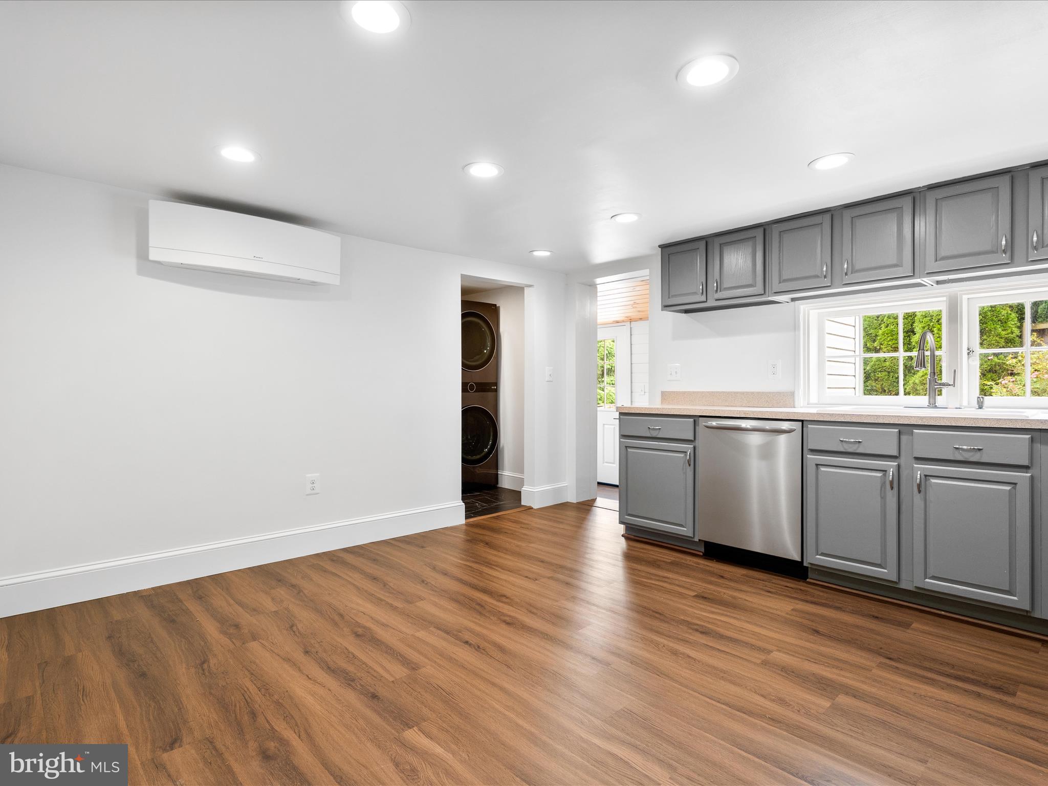 4417 Reels Mill Road Frederick, MD 21704 - Photo 17 of 64 a view of a kitchen with a sink and wooden floor
