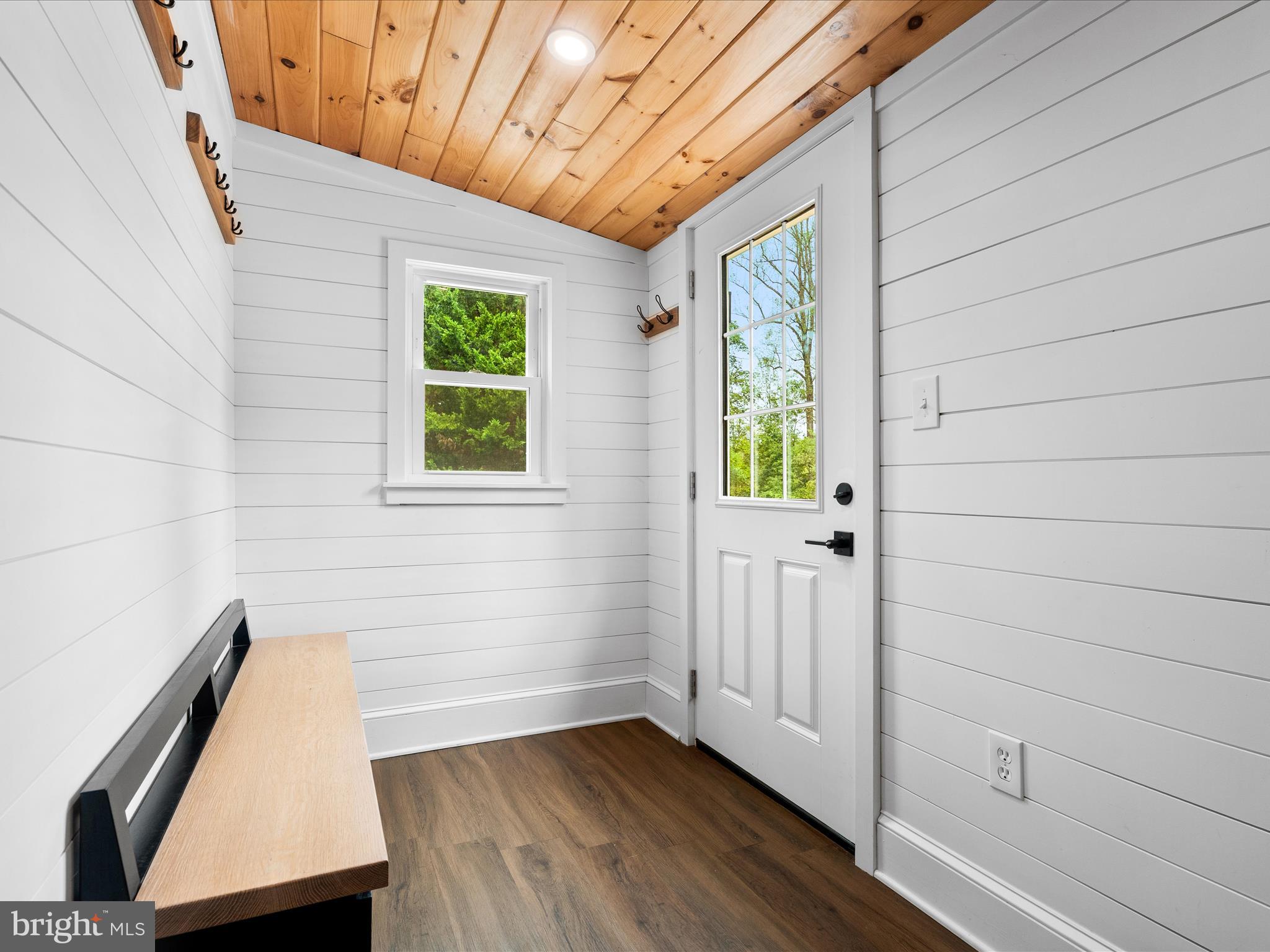 4417 Reels Mill Road Frederick, MD 21704 - Photo 20 of 64 a view of an empty room with wooden floor and a window