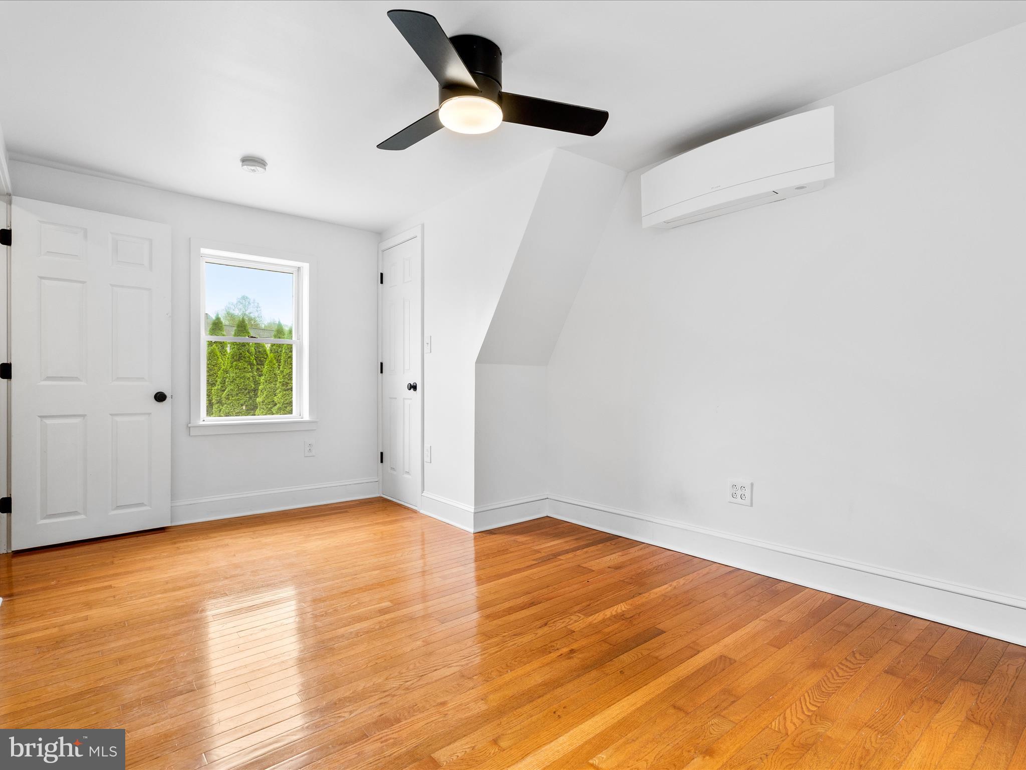 4417 Reels Mill Road Frederick, MD 21704 - Photo 26 of 64 wooden floor in an empty room with a window
