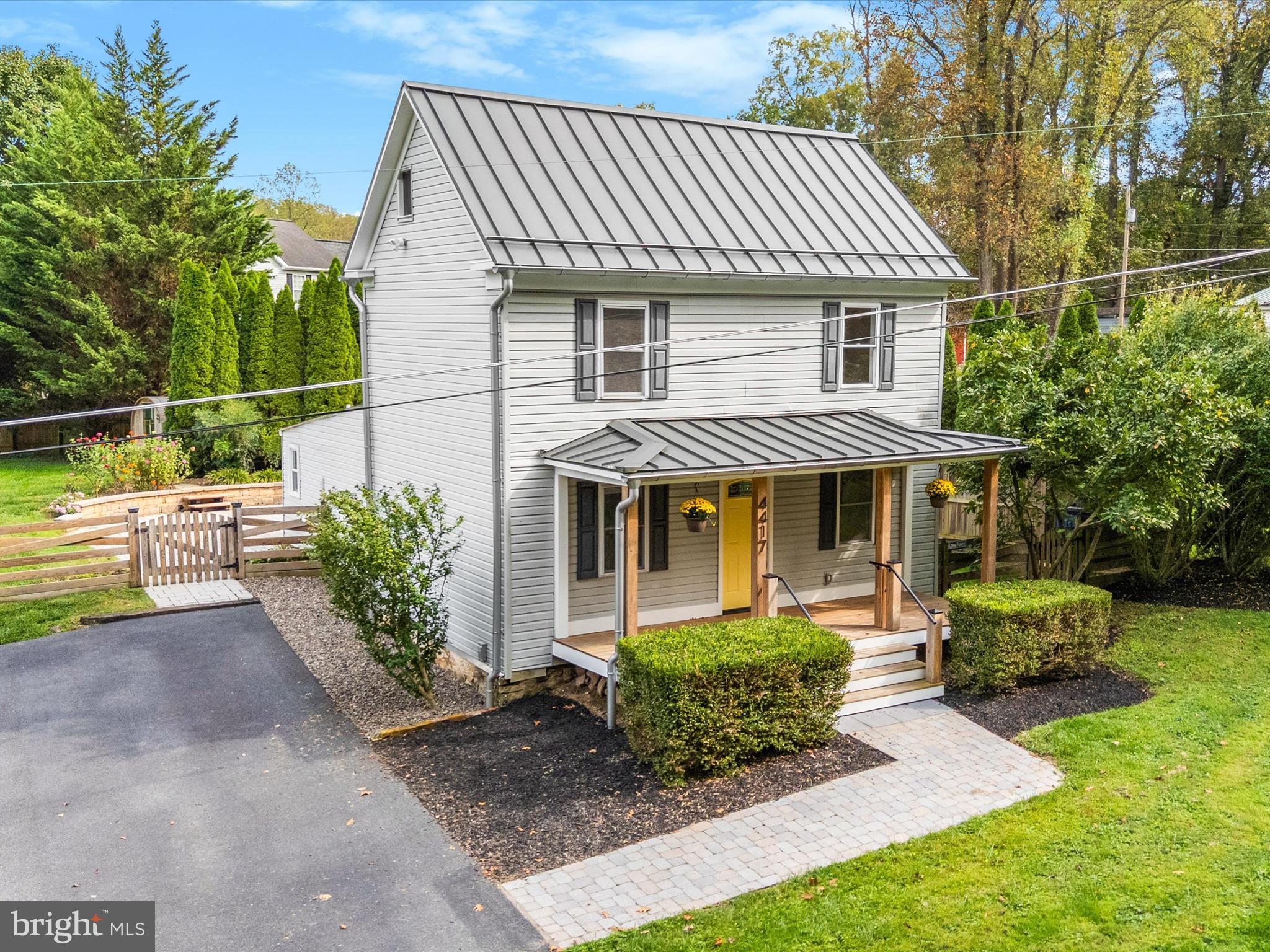 4417 Reels Mill Road Frederick, MD 21704 - Photo 49 of 64 a front view of a house with a yard