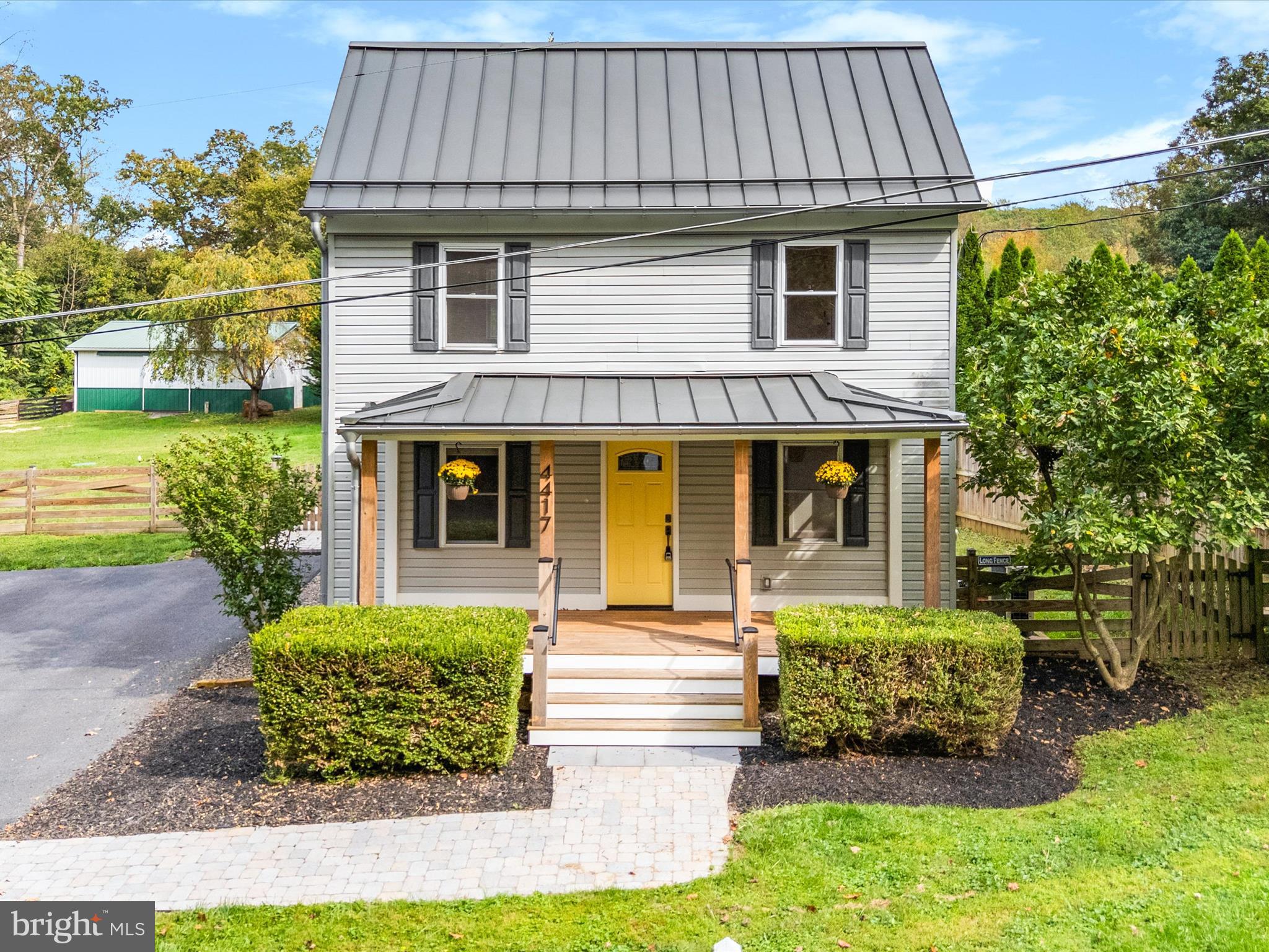 4417 Reels Mill Road Frederick, MD 21704 - Photo 50 of 64 a front view of a house with a yard