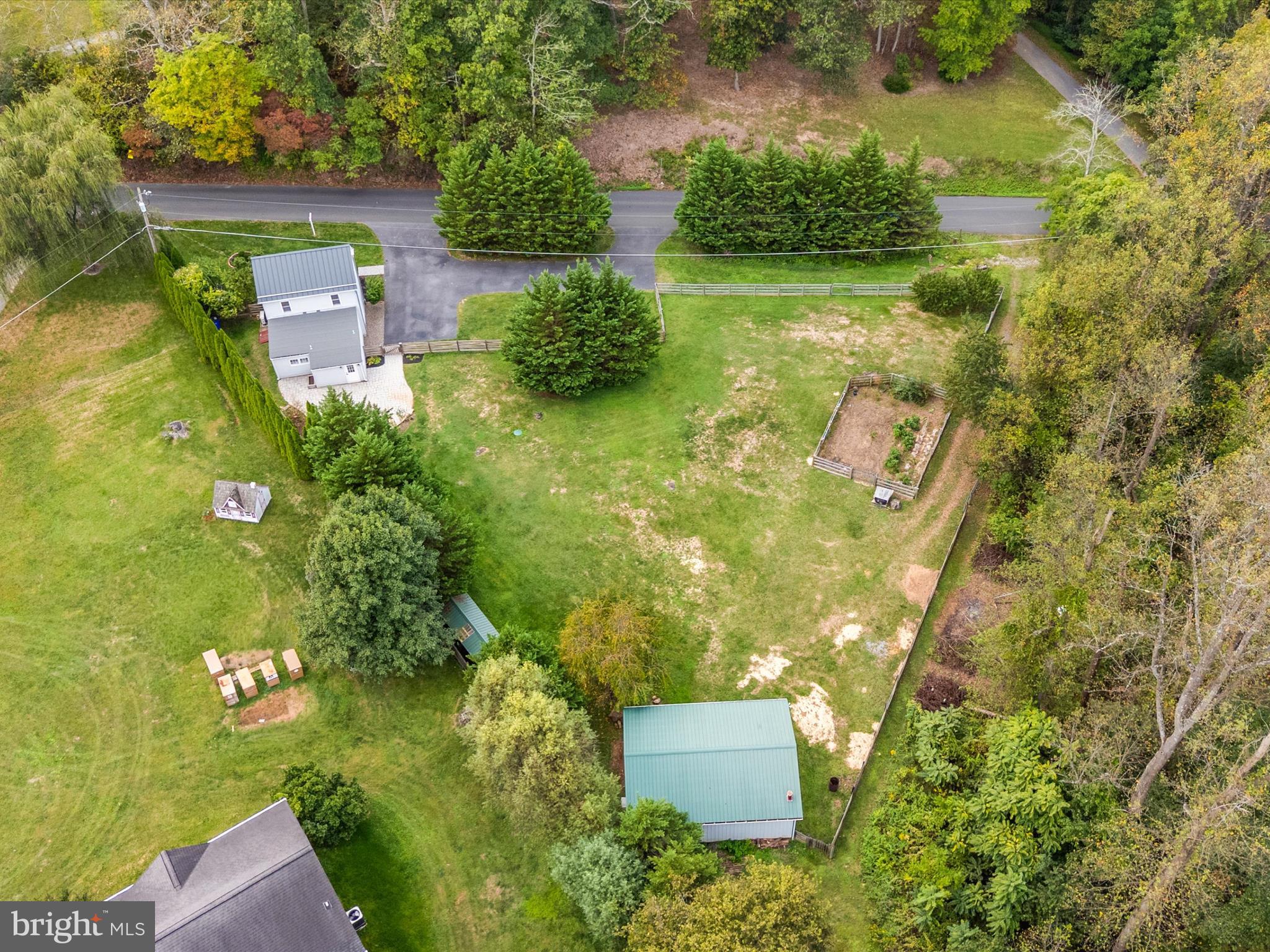 4417 Reels Mill Road Frederick, MD 21704 - Photo 57 of 64 an aerial view of residential house with pool and yard
