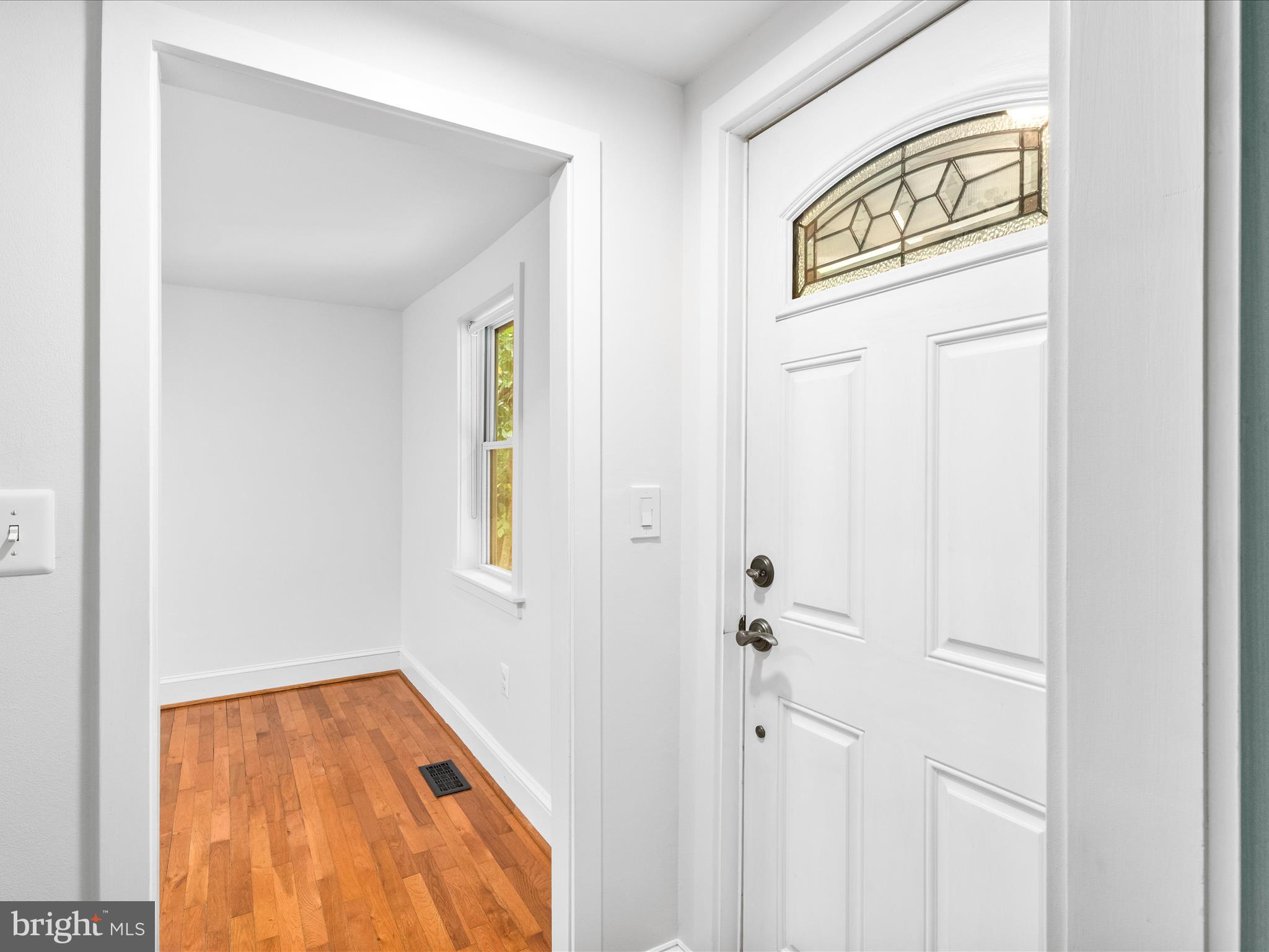 4417 Reels Mill Road Frederick, MD 21704 - Photo 8 of 64 a view of a hallway with wooden floor and closet