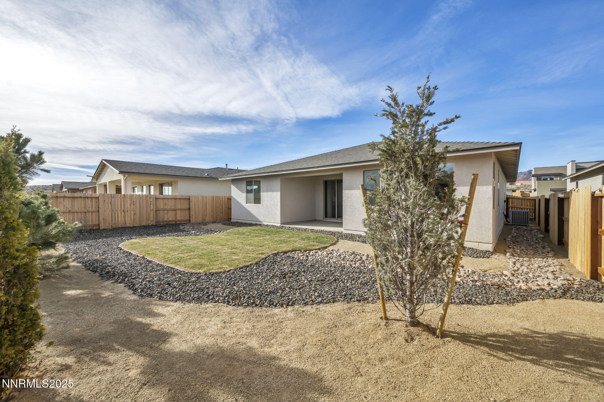 1333 Nebula Road, Unit HOMESITE 45 Carson City, NV 89705 - Photo 16 of 19 a front view of a house with garden