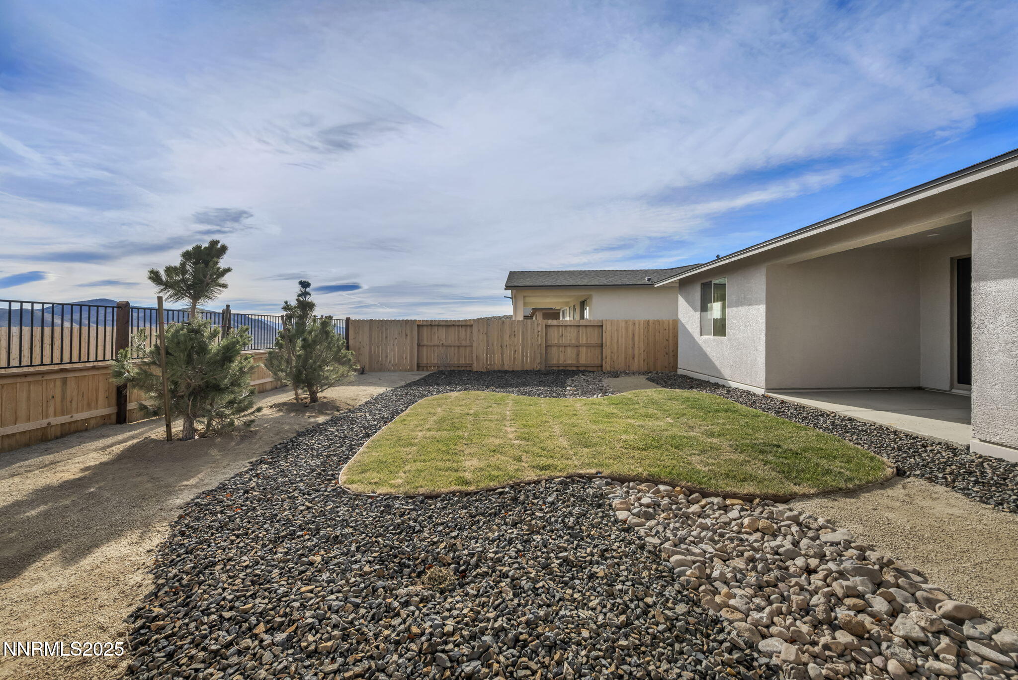 1333 Nebula Road, Unit HOMESITE 45 Carson City, NV 89705 - Photo 17 of 19 a front view of a house with a yard