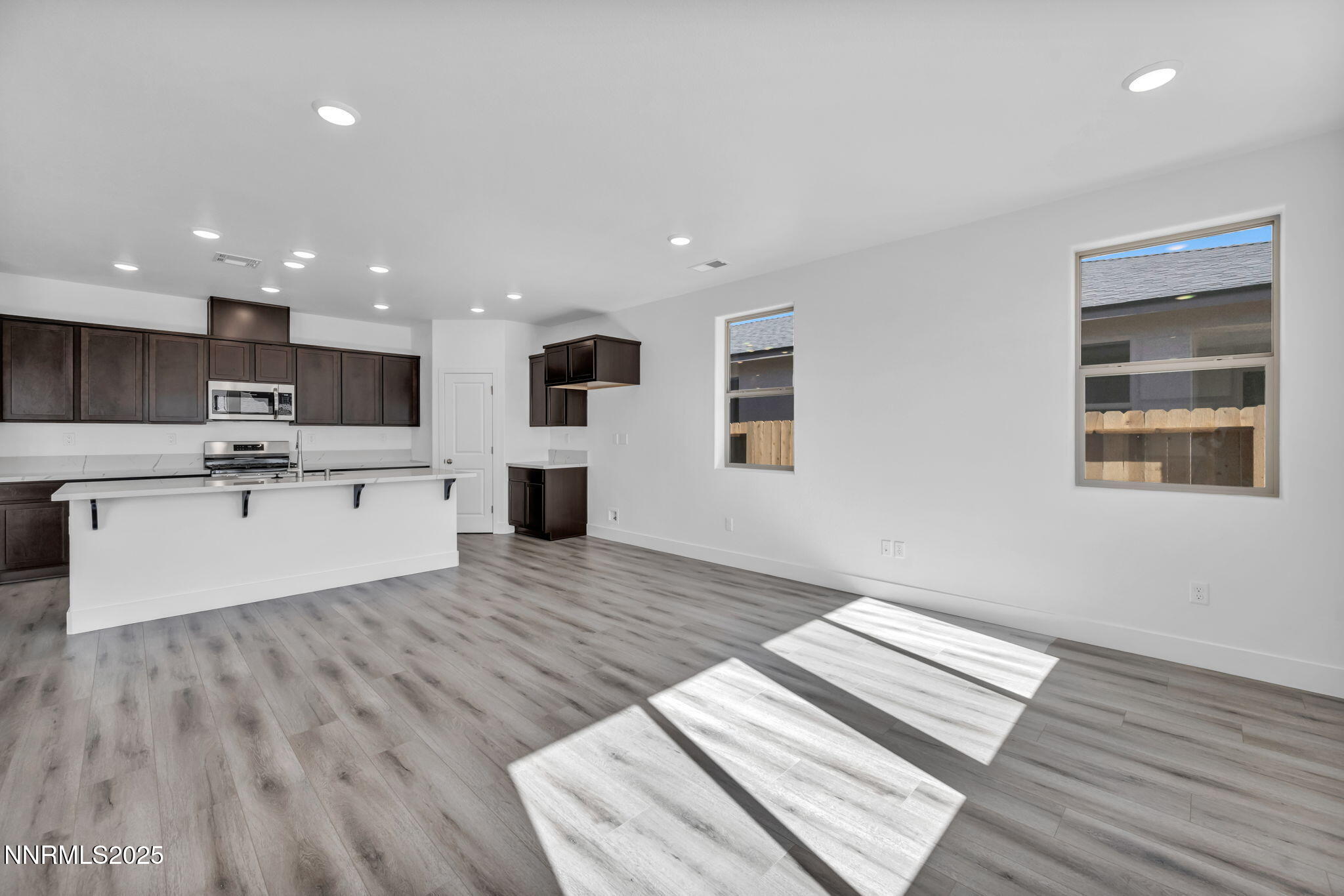 1333 Nebula Road, Unit HOMESITE 45 Carson City, NV 89705 - Photo 5 of 19 a view of kitchen with wooden floor and window