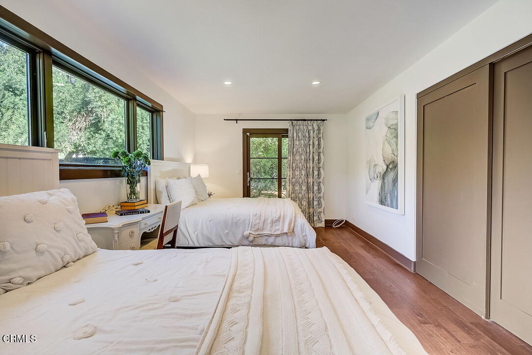 1717 East Mendocino Street Altadena, CA 91001 - Photo 28 of 68 a bedroom with two large bed and a large window