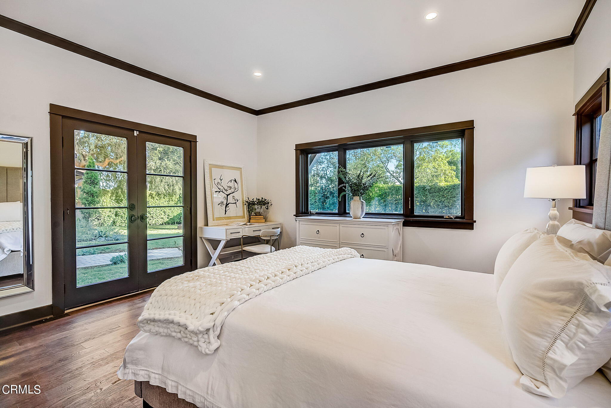 1717 East Mendocino Street Altadena, CA 91001 - Photo 30 of 68 a bedroom with a large bed and a large window