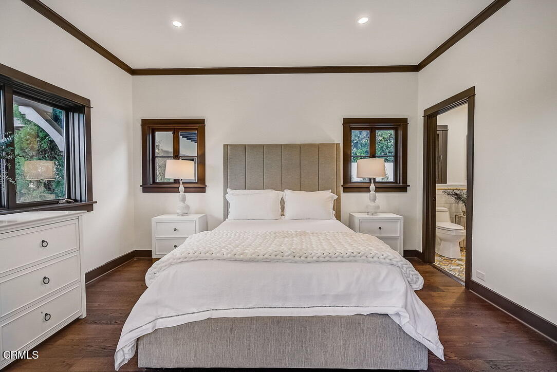 1717 East Mendocino Street Altadena, CA 91001 - Photo 31 of 68 a bedroom with a large bed and a window