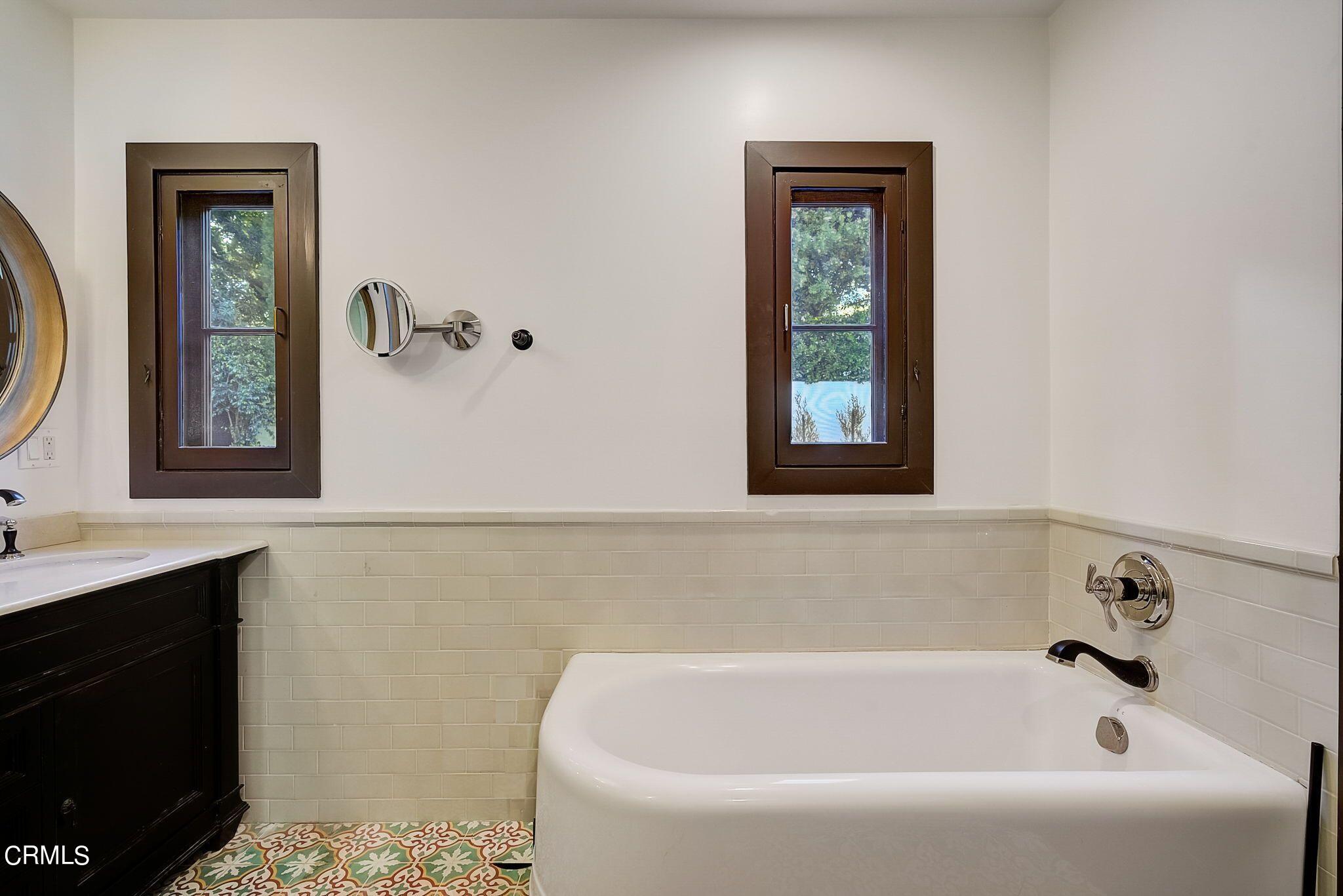 1717 East Mendocino Street Altadena, CA 91001 - Photo 36 of 68 a white bath tub sitting next to a window