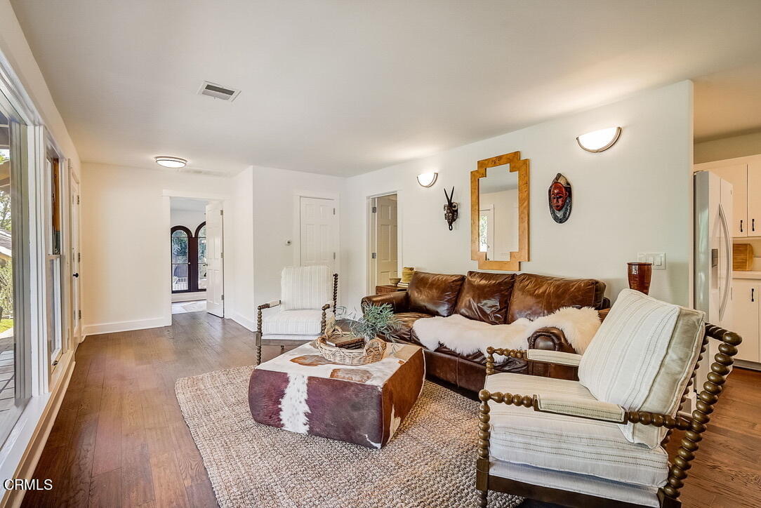 1717 East Mendocino Street Altadena, CA 91001 - Photo 44 of 68 a living room with furniture and a rug
