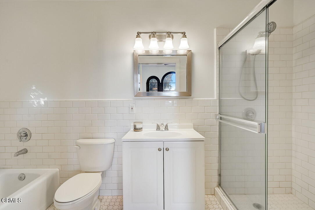 1717 East Mendocino Street Altadena, CA 91001 - Photo 53 of 68 a bathroom with a sink a toilet and shower