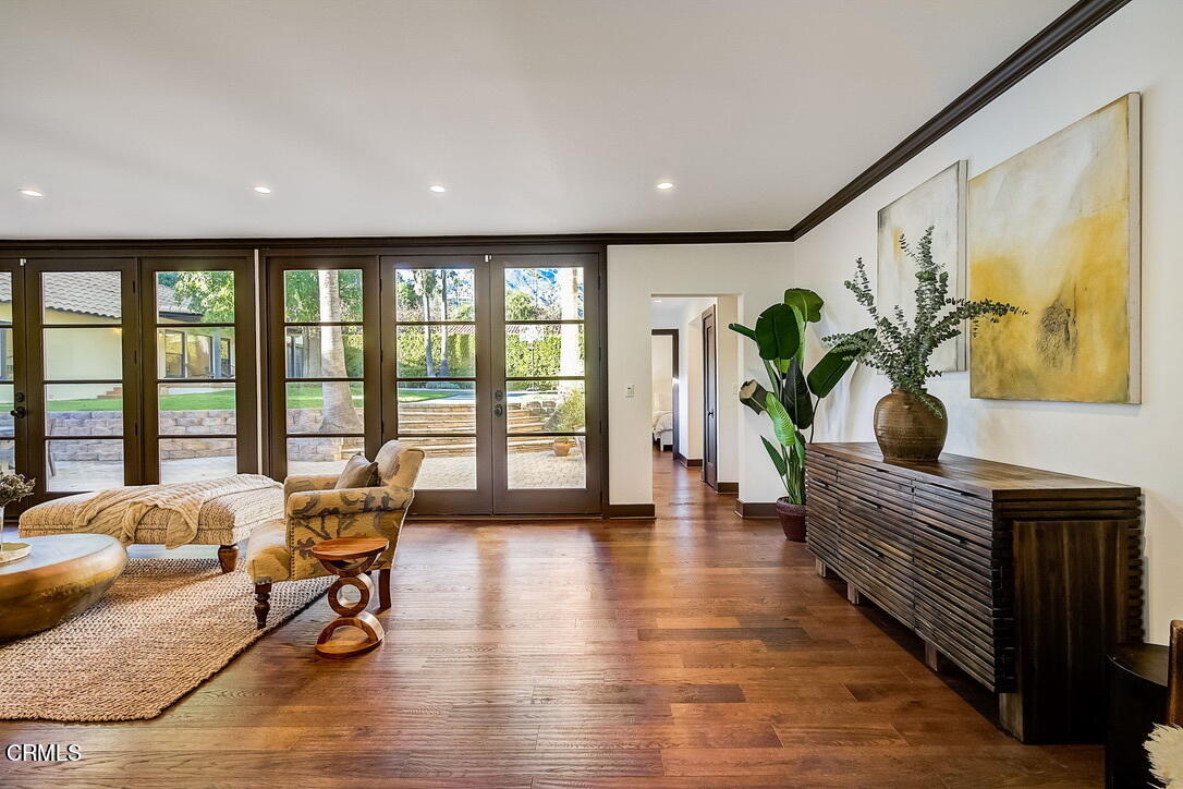 1717 East Mendocino Street Altadena, CA 91001 - Photo 10 of 68 a living room with furniture floor to ceiling window and wooden floor