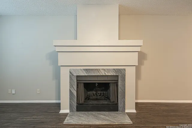 a white building with a fireplace