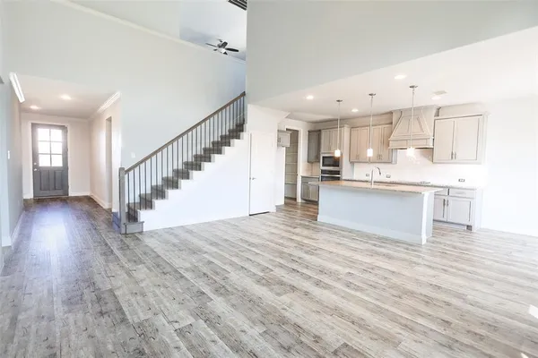 a view of kitchen and wooden floor