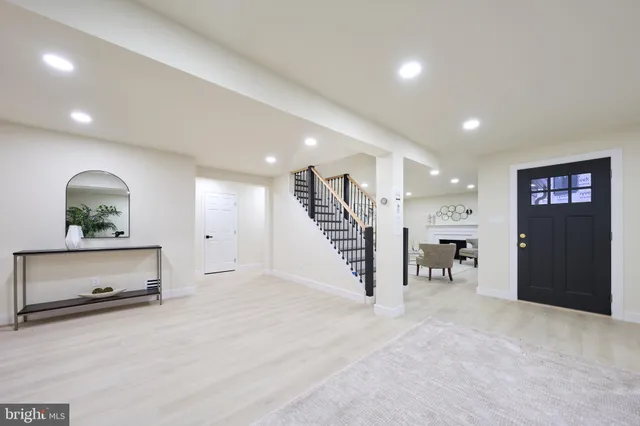 a white bath tub sitting next to a window