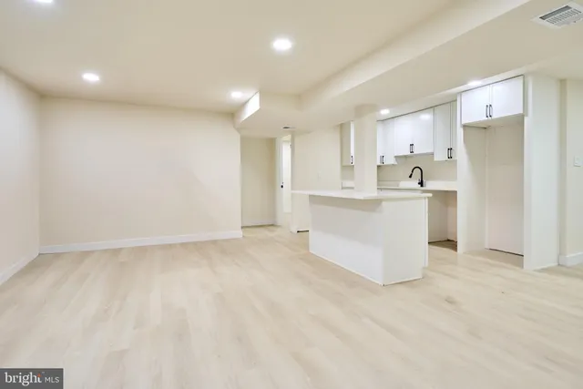 a bathroom with a toilet and a sink