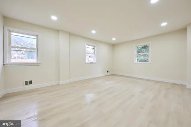 a kitchen with cabinets and a sink
