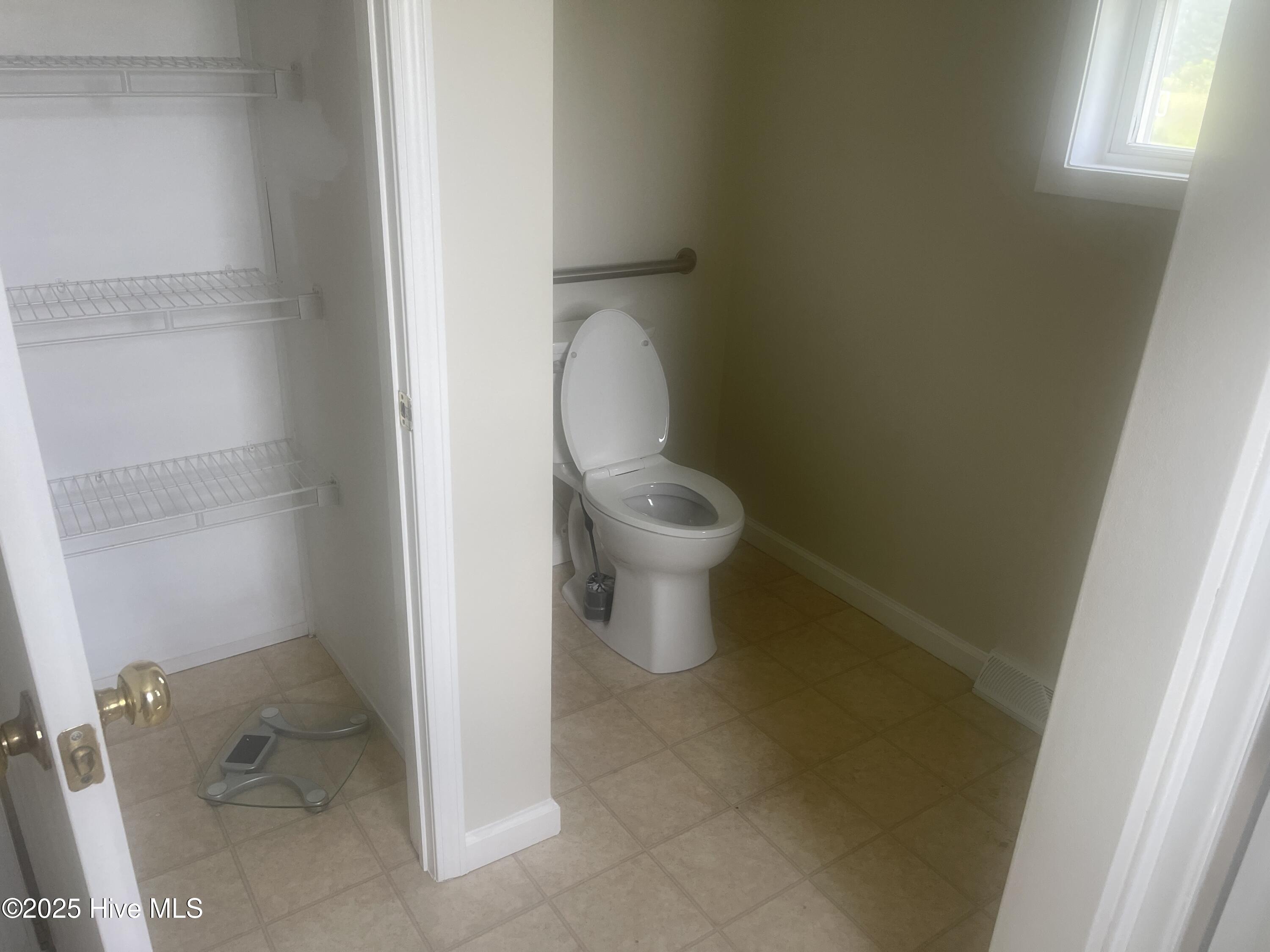 198 M M Ray Road Nakina, NC 28455 - Photo 9 of 15 Bathroom picture 2 with linen cabinet