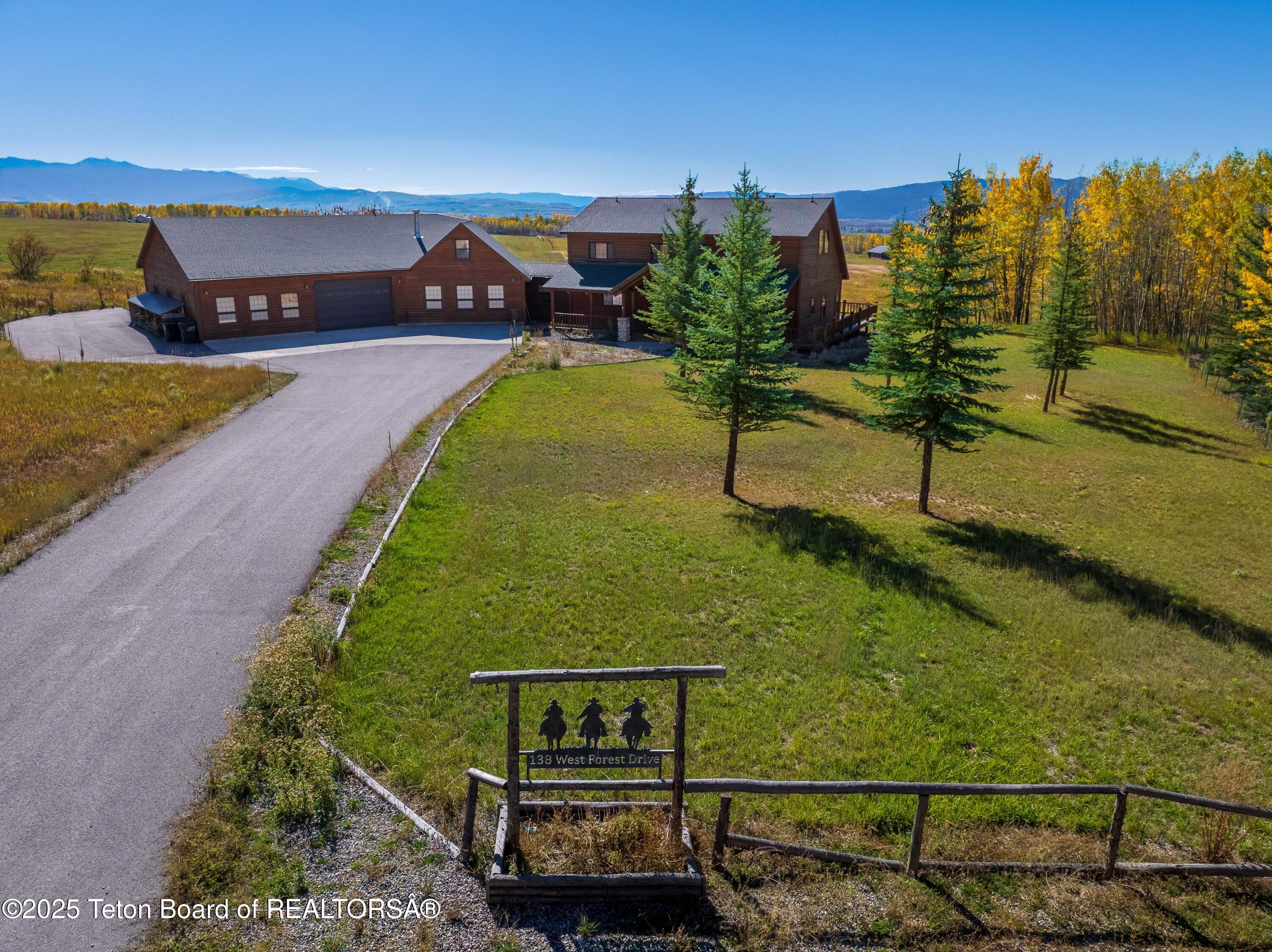 138 W Forest Star Valley Ranch, WY 83127 - Photo 1 of 83 138 W Forest_0604_D-HDR