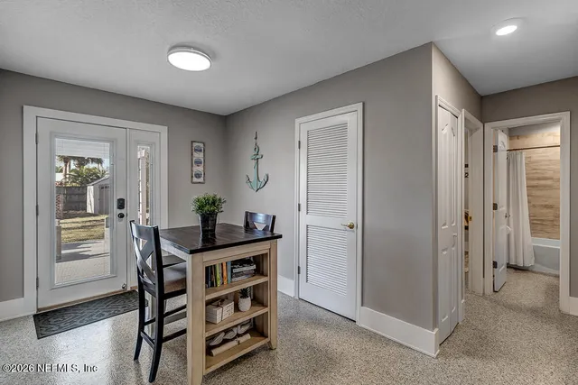 a view of a livingroom with furniture