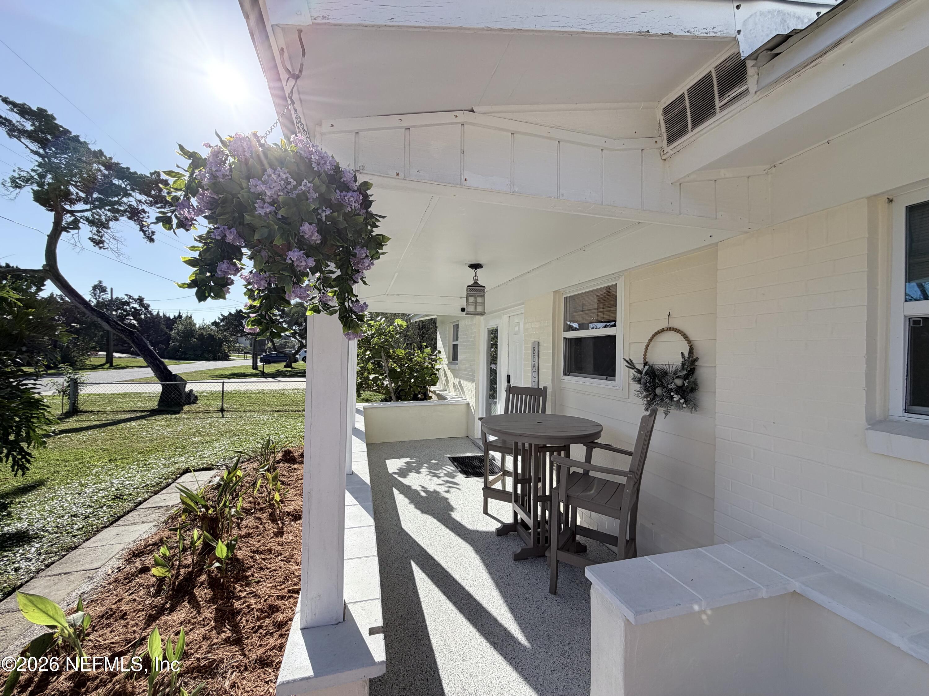 5437 3rd Street St. Augustine, FL 32080 - Photo 5 of 35 a view of a house and backyard and sitting area