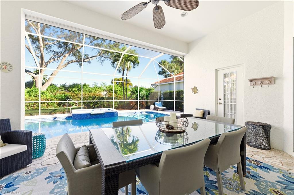 1777 Marsh Run Naples, FL 34109 - Photo 24 of 34 a view of an outdoor dining space with furniture