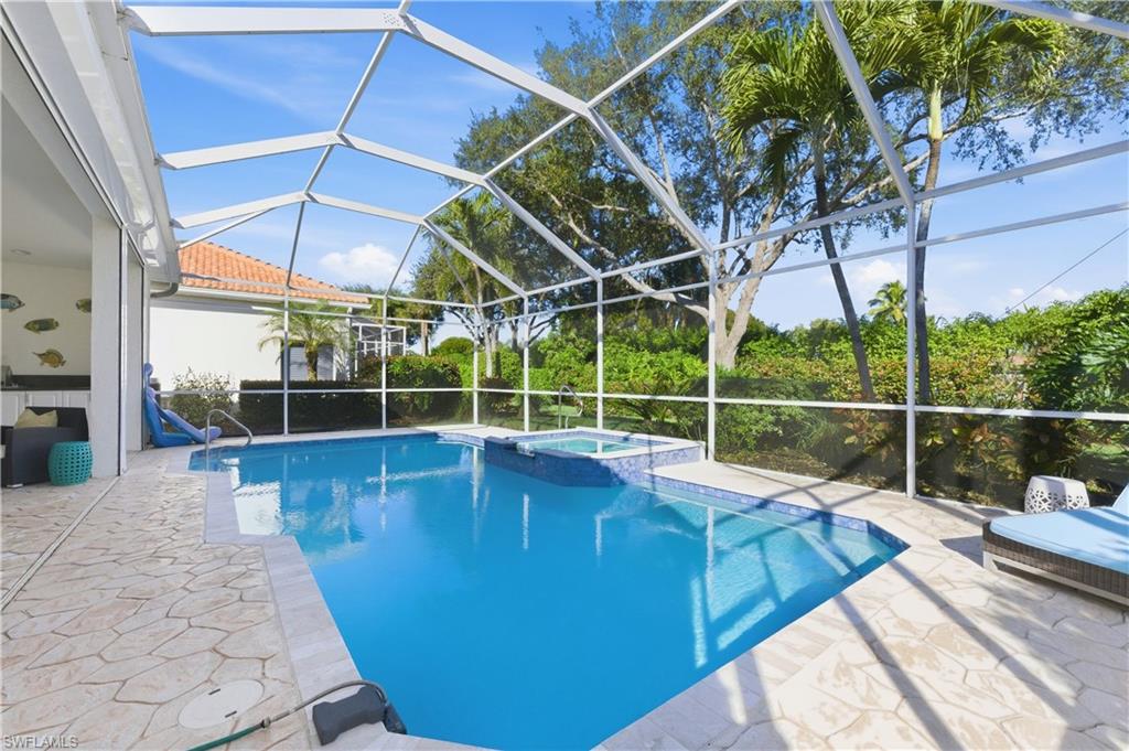 1777 Marsh Run Naples, FL 34109 - Photo 29 of 34 a view of a house with a backyard