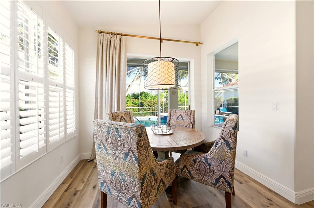 1777 Marsh Run Naples, FL 34109 - Photo 5 of 34 a view of a dining room with furniture window and outside view