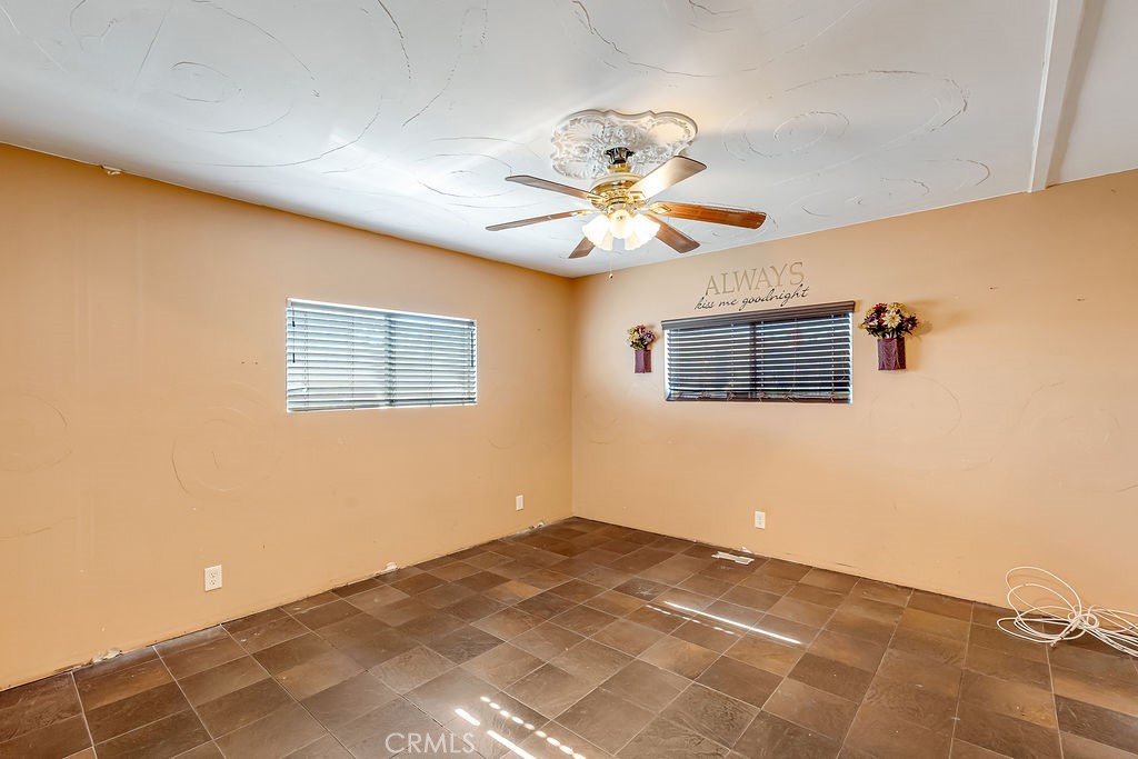 9999 Foothill Boulevard, Unit 48 Rancho Cucamonga, CA 91730 - Photo 25 of 38 Primary bedroom.