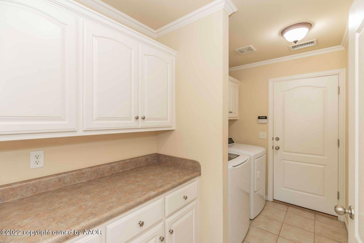 5801 South Rusk Street Amarillo, TX 79118 - Photo 27 of 27 a bathroom with a granite countertop sink and