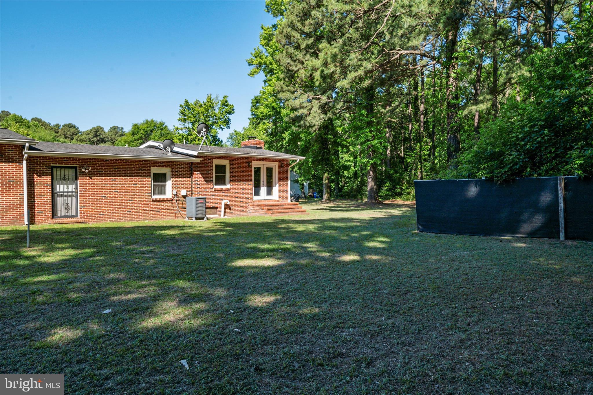 108 Wilson Road Grasonville, MD 21658 - Photo 36 of 38 a front view of house with yard and green space