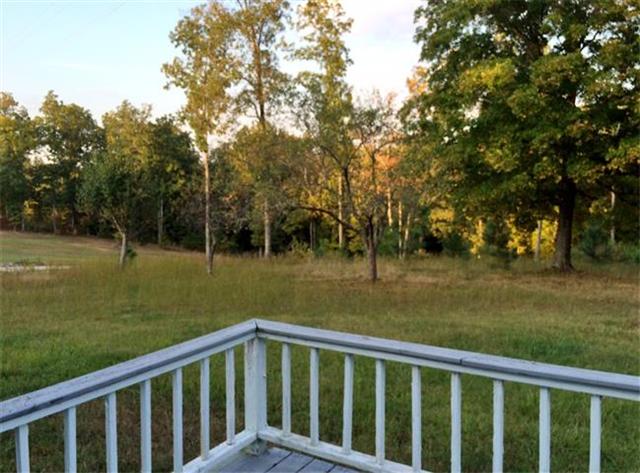 136 Big A Road Dover, TN 37058 - Photo 3 of 14 Sun deck with views of the fruit trees.