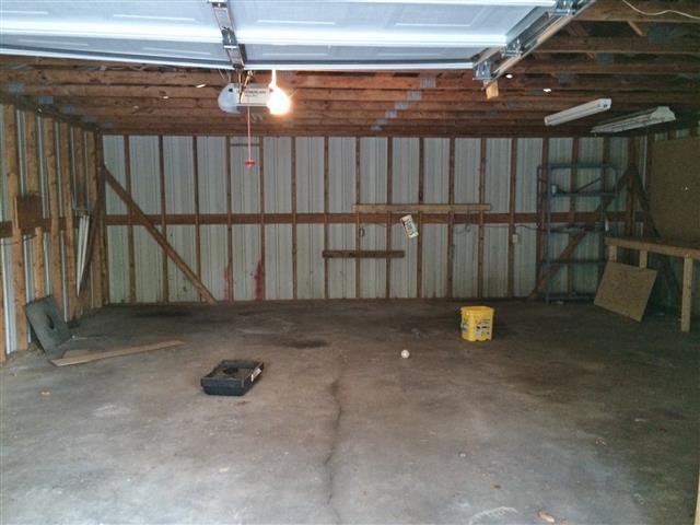 136 Big A Road Dover, TN 37058 - Photo 5 of 14 Garage has a concrete floor and work space.