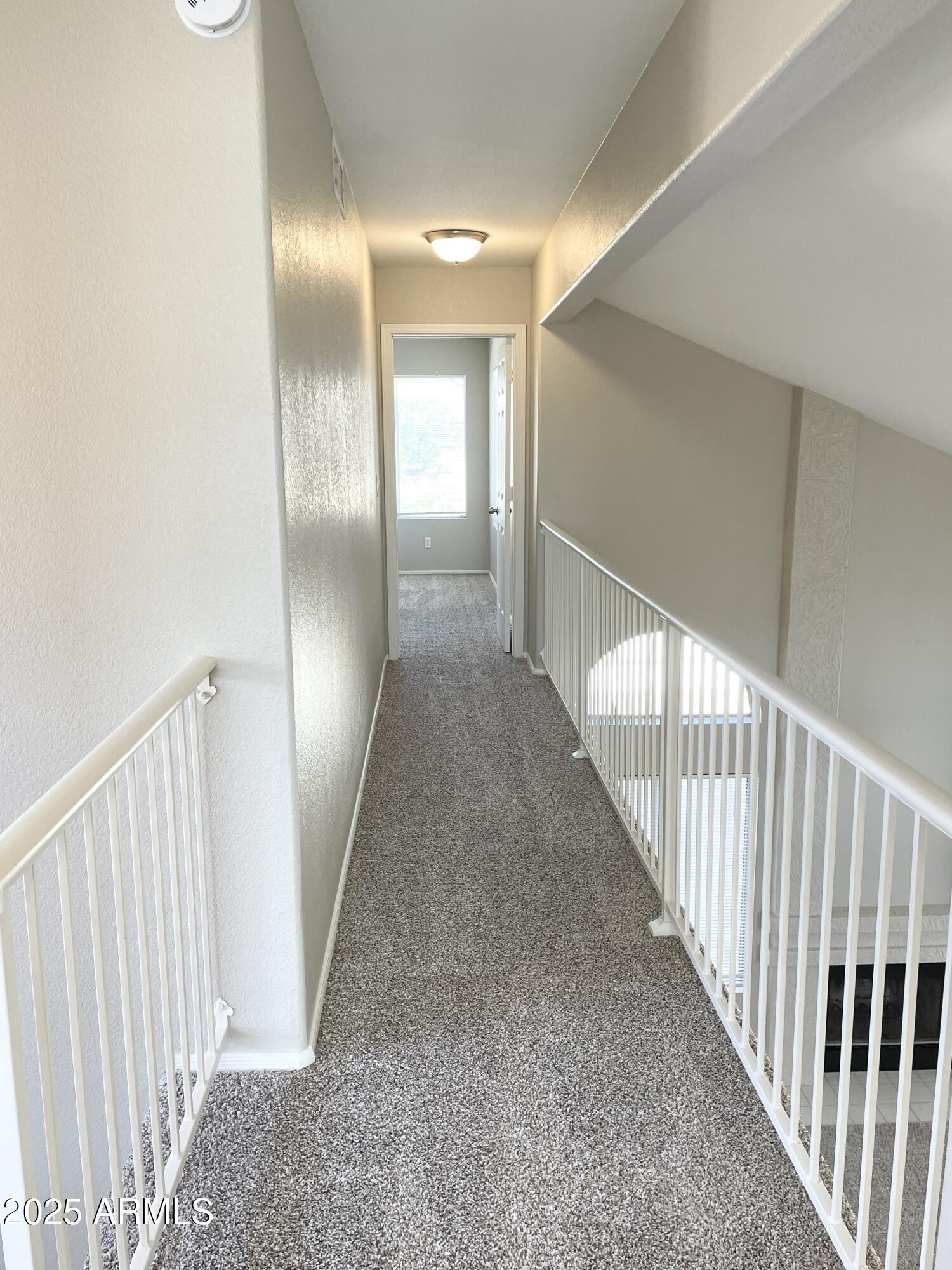 14452 South 43rd Street Phoenix, AZ 85044 - Photo 18 of 33 a view of a hallway with staircase