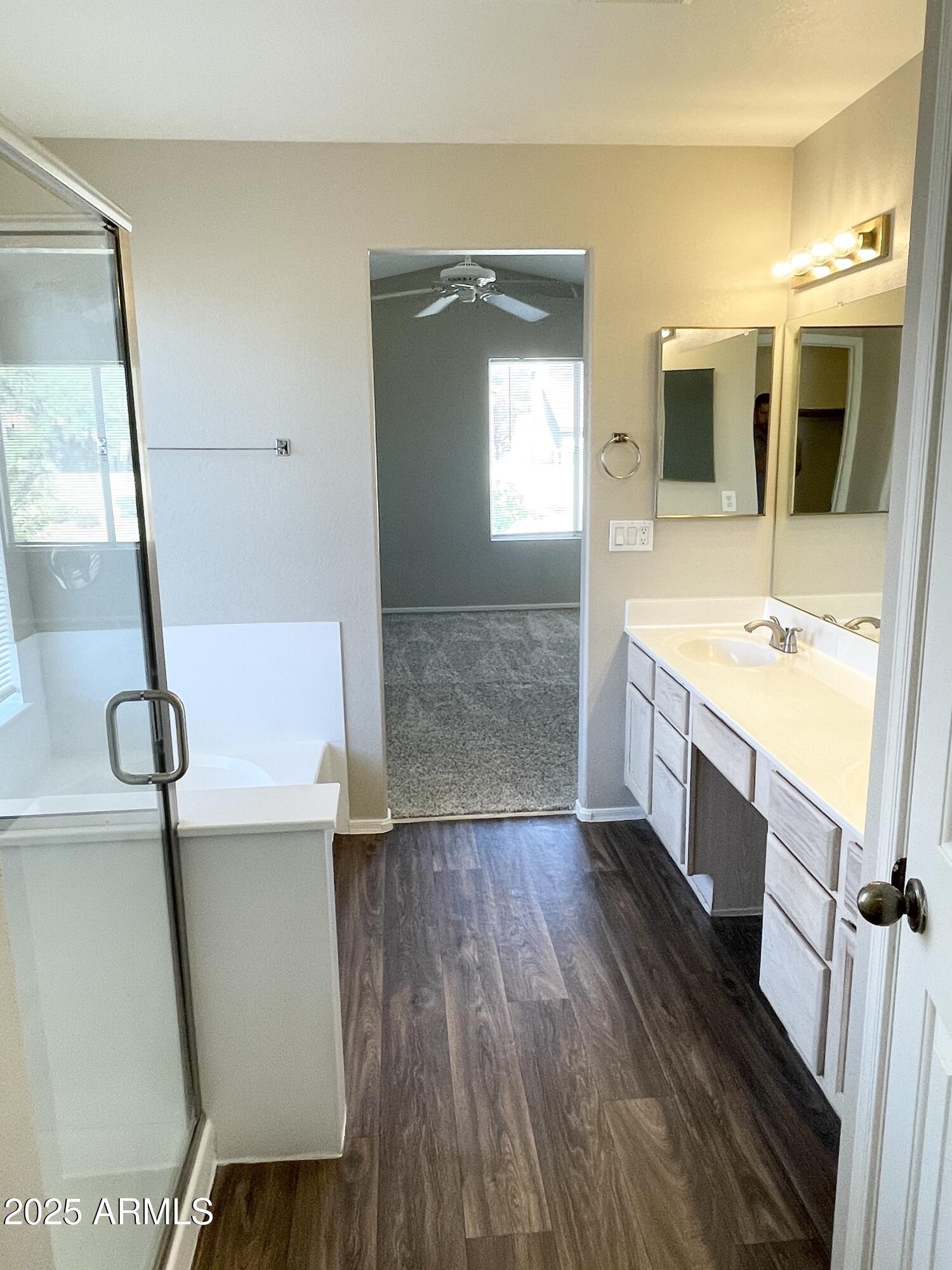 14452 South 43rd Street Phoenix, AZ 85044 - Photo 23 of 33 a bathroom with a sink a mirror and a toilet